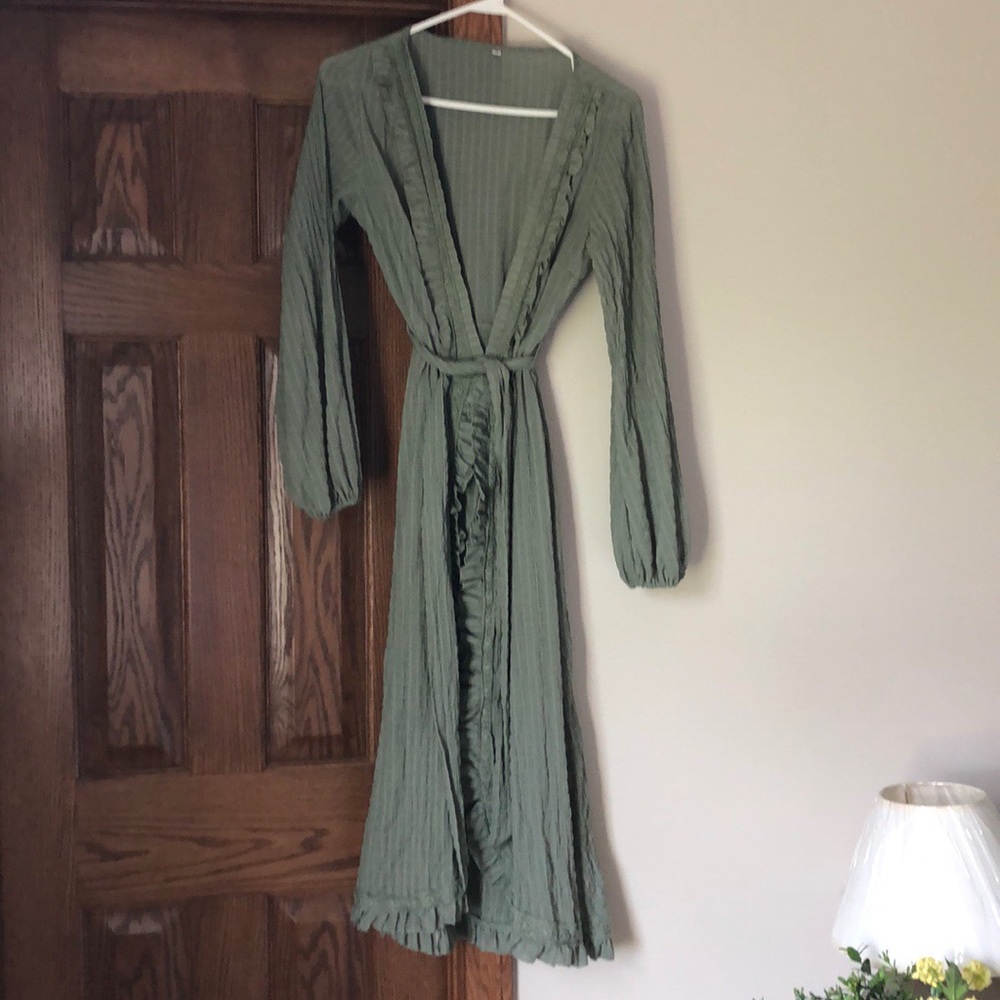 Sage green wrap dress with ruffle detail